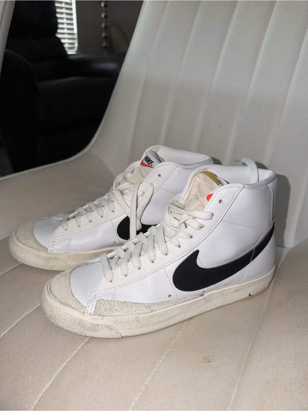 Nike White and Black High-Top Sneakers with Orange Tongue Accent